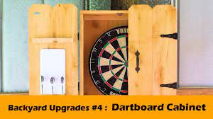 simple dartboard cabinet with rustic