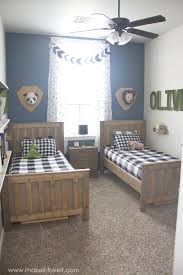 This transitional boy's room is equipped with an expansive homework station and a cozy seating area to tie tennis shoes by their teen years, your kids will have accumulated an eclectic collection of room decor. Ideas For A Shared Boys Bedroom Yay All Done Small Kids Room Boys Room Decor Shared Boys Rooms