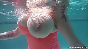 Big tits in pool
