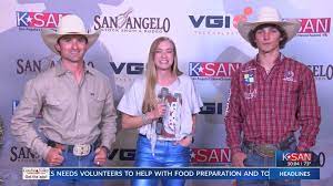 Bull riders Gavin Michel and Tristan Parker talk with Senora Scott