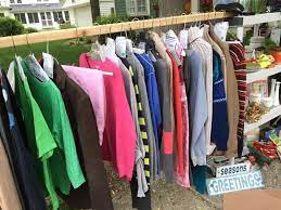 Ladders work wonders as a clothing display rack (if you're selling any clothing items). Yard Sale Tips Tricks How We Made 1549