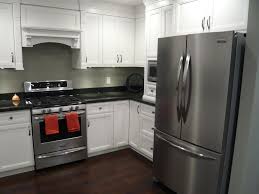 Stainless steel kitchen appliance packages | how to buy appliances. Kitchens Scotwend Homes Ltd Black Stainless Appliances White Cabinets Black Countertops Black Kitchens