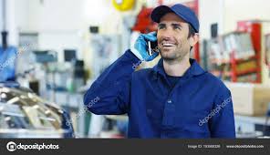 Assistant Mechanic Calls Customers For Communication In The