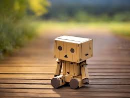 small wooden toy robot danbo lonely