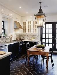 Additionally, white cabinets are effective at. Black And White Cabinets White Top Black Bottom Black Tile Brick Floor Diagonal Big Iron Lantern Pendant Wood Table In Kitchen Tommy Smythe Pender Peony A Southern Blog