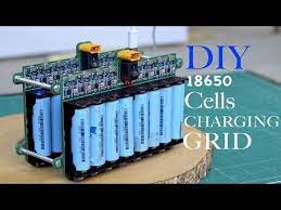 The world is shifting away from fossil fuels and will one day become fully electric. Diy 18650 Lithium Ion Cells Charging Grid I Have Been Working On Motorising My Bicycle Using A Geared Electronics Projects Diy Batteries Diy Battery Generator