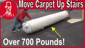 how to move a heavy carpet you