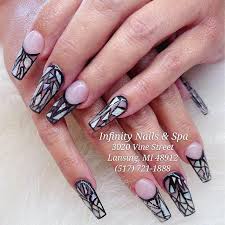 infinity nails and spa 48912 best