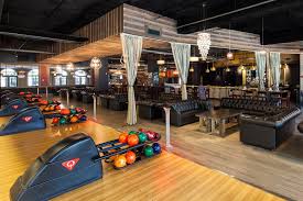 Bowling Alley With Tufted Black Sofas Find Other Tufted