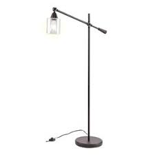 The swing arm perfectly positions light just where you need it. Boston Loft Furnishings Lefou 61 75 In Black Foot Switch Downbridge Built In Table Floor Lamp With Glass Shade Lowes Com Lamp Task Floor Lamp Floor Lamp