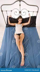 Woman Handcuffed Bedframe Cast Iron Stock Image - Image of inside, pillow:  20201187