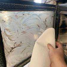 how to clean fireplace glass