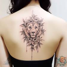symbolism of lion and flowers tattoos