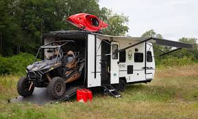 This trailer was made to fit inside a garage and also expand to a comfortable size when taken out. 5 Best Small Toy Hauler Rvs In 2021 Drivin Vibin