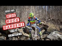 ride rocks on a dirt bike