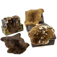 brown sheepskin rugs are thick and cushy