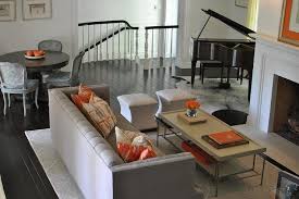 gray and orange living rooms
