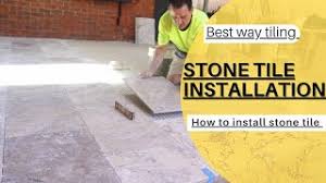 install stone tile on a alfresco floor