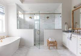 A Glass Shower Door Opens To A Walk In