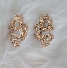 This is a beautiful new pair of 14 karat yellow gold dragon earrings. Jewelry Gold Dragon Earrings Poshmark