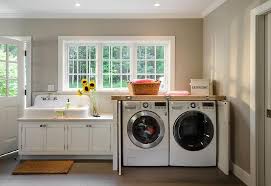 No matter how you decide to hide your washer and dryer, there are other things you can do to disguise your dirty laundry also. Washer And Dryer Cabinet With Fold In Doors Cottage Laundry Room