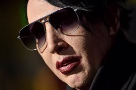 marilyn manson sued for ual ault