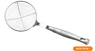 The le creuset stainless steel revolution wire skimmer provides quick and efficient drainage for lifting delicate fried foods. Le Creuset Small Is Beautiful Our Top 10 Kitchen Utensils