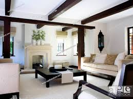 low black coffee table and cream sofas