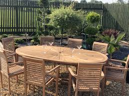 Wondering if an extending dining table and chairs is right for you? Teak Garden Furniture Premium Oval Table With 8 Teak Stacking Chairs Teak Garden Furniture Outlet