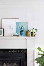 Styled Fireplace Mantel With Art