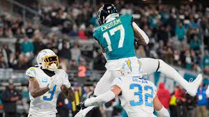 Jaguars’ Lawrence makes NFL playoff history with four first-half picks