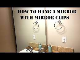 how to hang a mirror with mirror clips