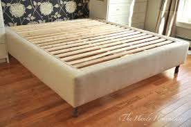 I gently pulled the thread taut to create a tufted look. Upholstered Bed Frame Diy Part 1