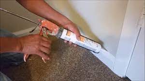 how to install and caulk baseboard trim