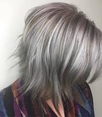Curly hair with blonde streaks. The Hottest Shades And Highlights For Gray Hair It S Rosy