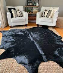 d black cowhide rug size 7 x 7