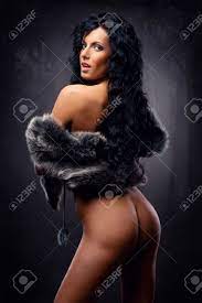 Gorgeous Naked Brunette Wearing Fur Coat Posing Indoors Stock Photo,  Picture and Royalty Free Image. Image 12074725.