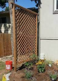 Bob vila demonstrates how to build a trellis. How To Build A Trellis 06 For The Passion Flower And Another Climbing Flower For Outside The Massage St Diy Garden Trellis Building A Trellis Backyard Privacy