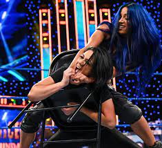 sasha banks tortures bayley with a