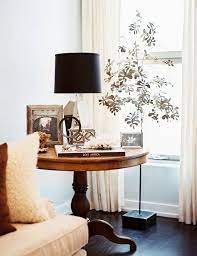love the metal tree side table decor