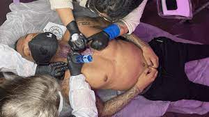 News now clips, interviews, movie premiers, exclusives, and more! Nick Cannon Gets Tattooed By Two Artists At Once Tattoo Ideas Artists And Models