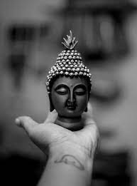 black buddha in hand hd wallpaper