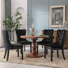 black velvet upholstered dining chairs