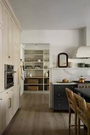 Beige Kitchen Cabinetry With Microwave