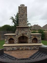 Outdoor Fireplace Built With River Rock