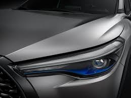 Corolla cross offered up to five seats inside and promised a more significant headroom for the rear passengers. 2021 Toyota Corolla Cross Is A New Compact Suv With An Optional Hybrid Engine Roadshow