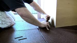 installing rubber gym flooring tiles