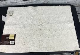 cotton ivory reversible bath rug 17x24