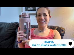 Xiapia 64 Oz Glass Water Bottle With
