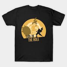 It passes through walls in its way, devouring any enemies it encounters. Overwatch Junkrat Shirt Rip Tire Fire In The Hole Overwatch Quote Videogames Design Overwatch Junkrat Ul Overwatch Quotes In The Hole Mens Tops